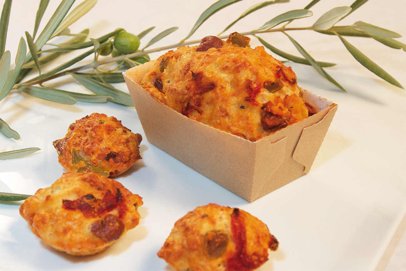 Mini ham cakes, olives and dried tomatoes